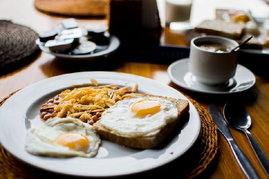 Breakfast with fried egg and beans