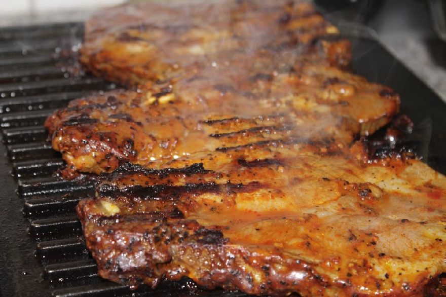 Grilled meat on grill