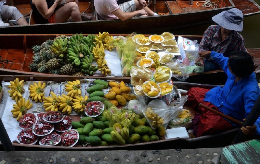 Fruits on boats in Thailand or Vietnam.