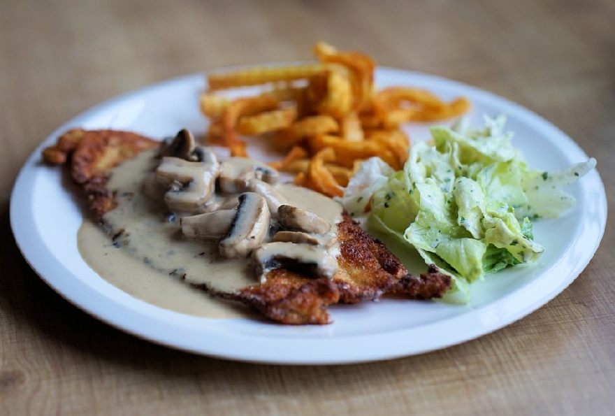 Schnitzel with fries and salad